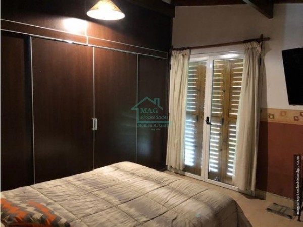 Chalet con Quincho y Piscina